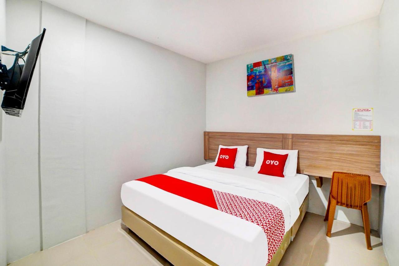 Oyo 91211 Mega Comfort Guest House Medan Buitenkant foto